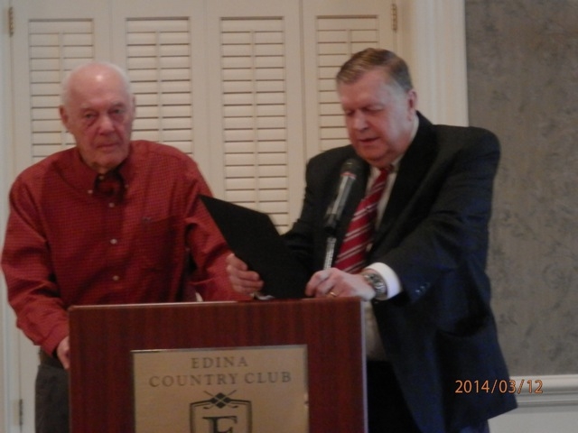 Bud Grant receiving his certificate of appreciation from President Jim Ullyot